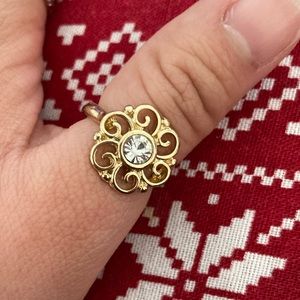 Gold color flower with rhinestone
